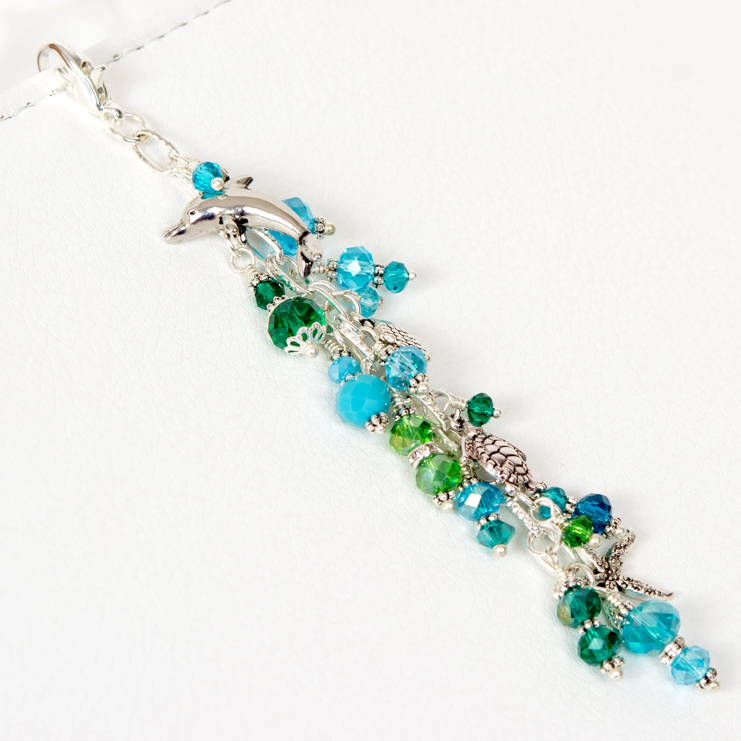 Dolphin Planner Charm with Blue & Green Crystals and Sea Turtle, Clam Shell & Starfish Charms