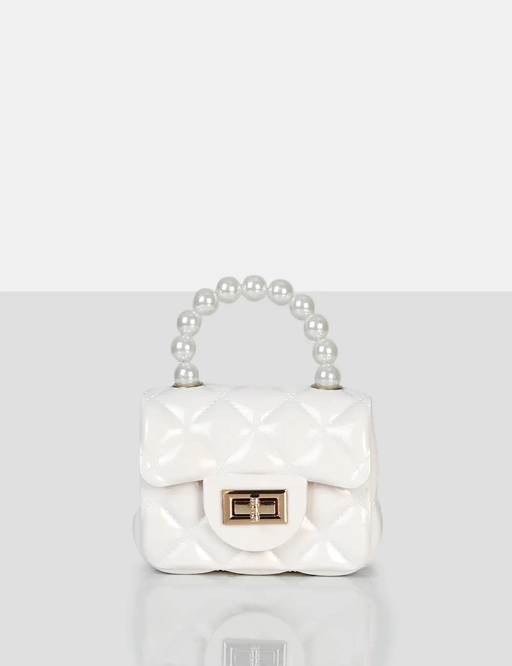 The Iddy White Patent Pearl Mini Bag