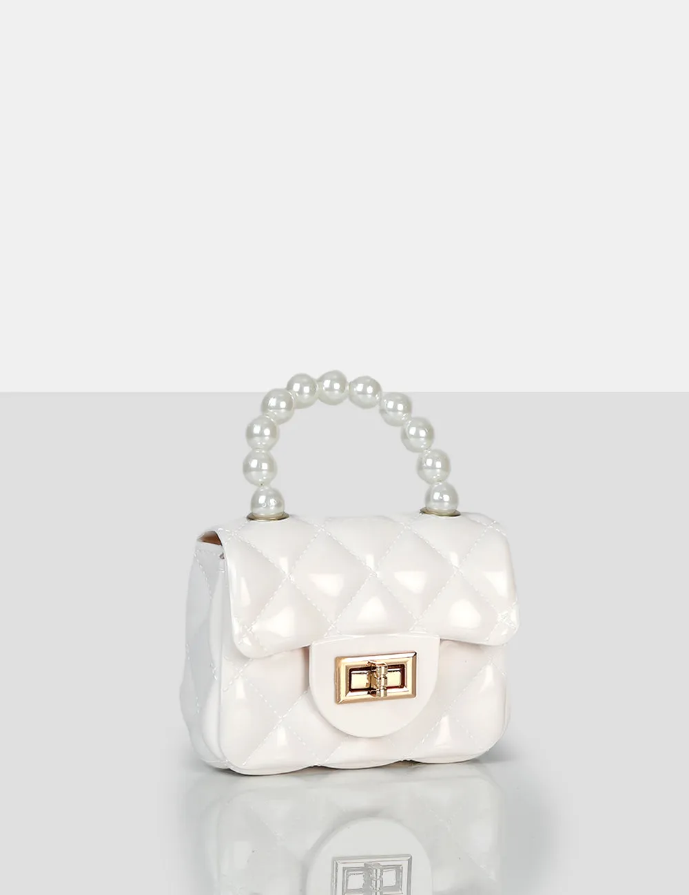 The Iddy White Patent Pearl Mini Bag